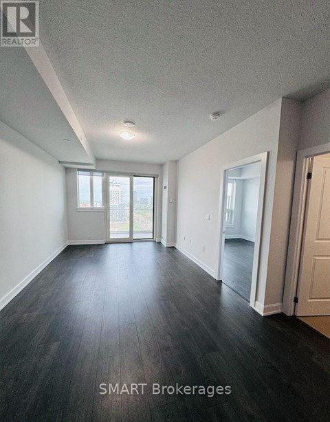 A room with a window and a door is shown.