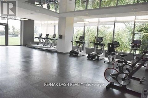 A gym with treadmills and exercise bikes.