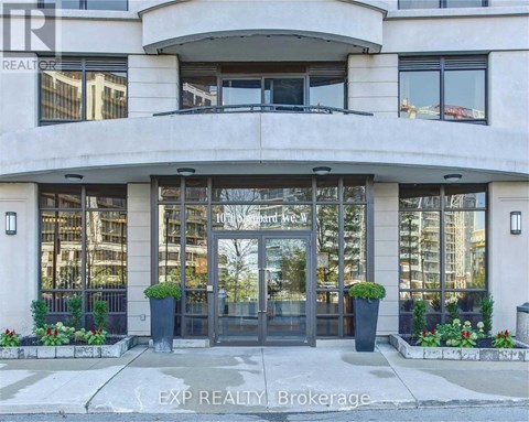 The front of a building with the words EXP REALTY Brokerage on it.