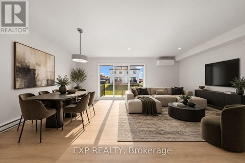 A modern living room with a dining area and a view of the outside.