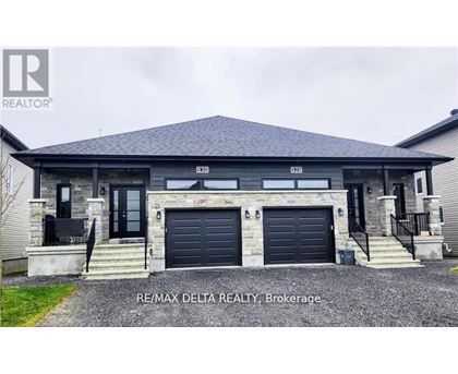 A two-story house with a garage is for sale in Brokerage.