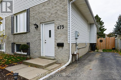 A house with the number 475 on the front wall.