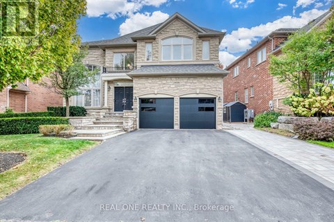 A large, two-story house with a garage is surrounded by a well-maintained lawn and other residential homes.