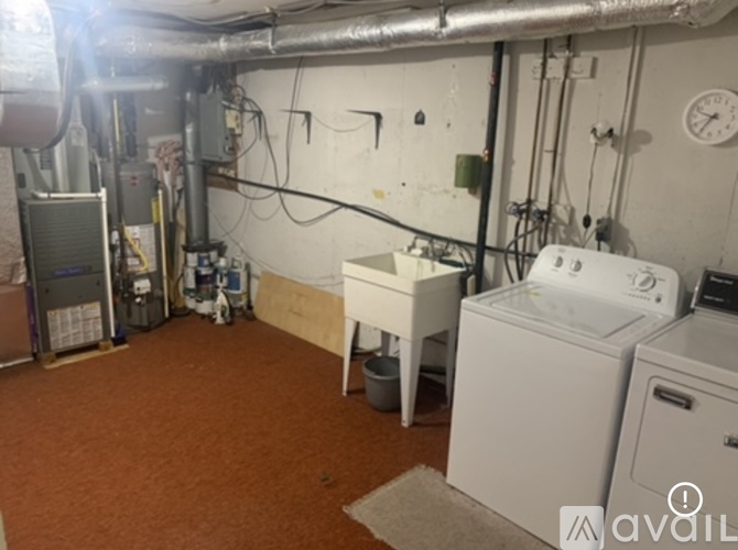 A laundry room with a washer and dryer.