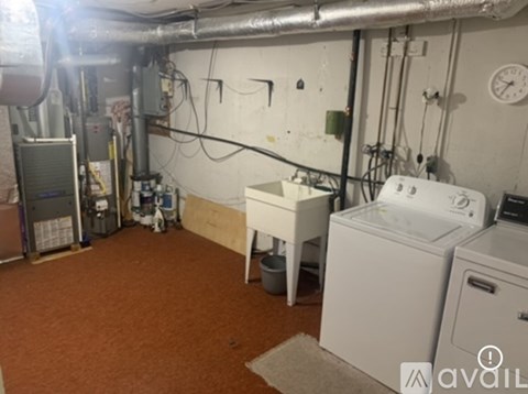 A laundry room with a washer and dryer.