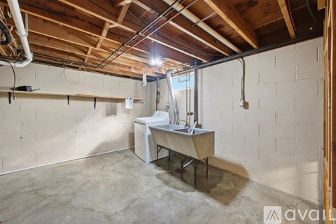 A room with a table and chairs in it.