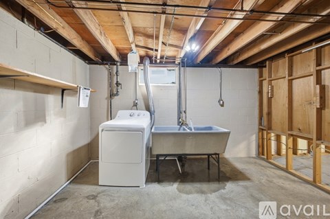 A bathroom under construction with a toilet and sink.