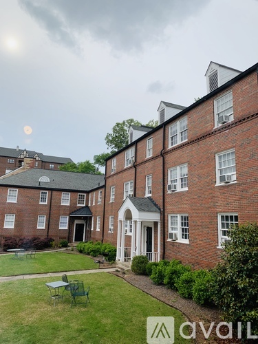 A brick building with a moon in the sky.