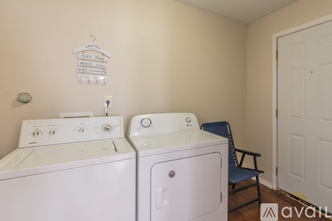 A laundry room with a washer and dryer.