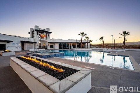 A modern house with a pool in the backyard.