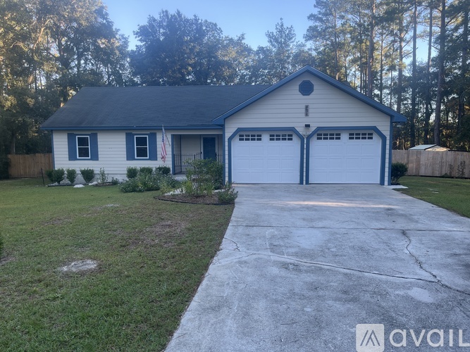 A two-car garage is attached to a house.