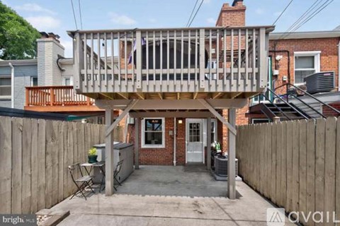 A house with a deck and a patio.