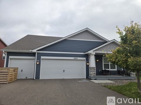 A two-car garage is attached to a house.