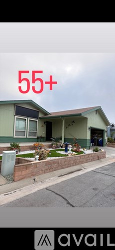 A house with the number 55+ written in red on the top left corner.