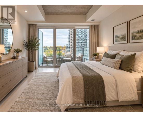 A bedroom with a large bed, a dresser, and a view of the city.