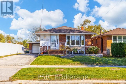 A house with a lawn in front of it is for sale.