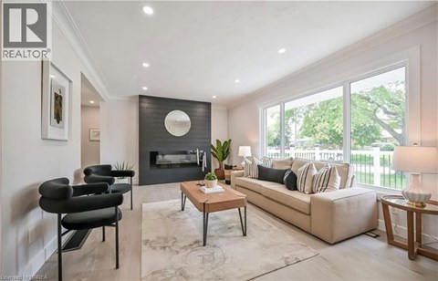 A living room with a fireplace and a couch.