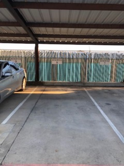 A car is parked in a parking lot.