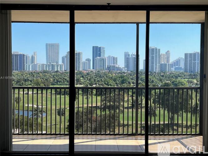 A view of a city skyline from a balcony.