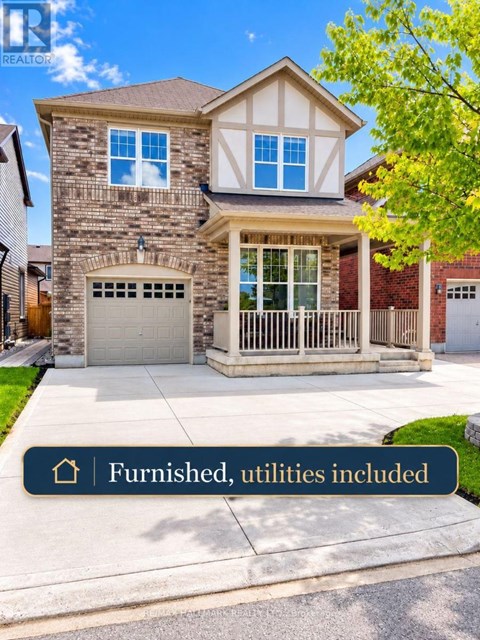 A house with a stone facade and a garage.