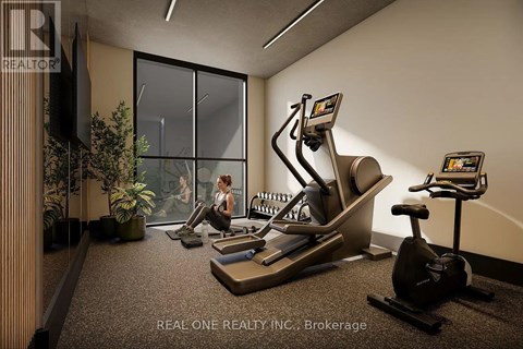A woman is working out on a treadmill in a gym.