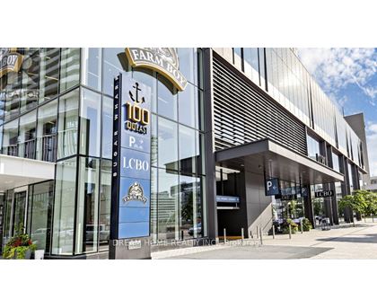 A modern building with a sign that reads "Farm Box" and "100 Podest P.Z.".