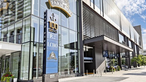 A modern building with a sign that reads "Farm Box" and "100 Podest P.Z.".