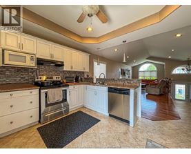 A kitchen with a stove top oven and a microwave.