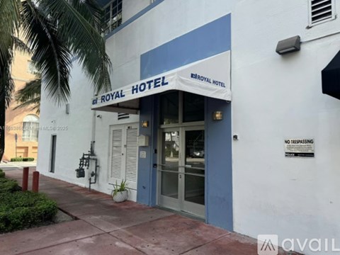 The front of the Royal Hotel with a no trespassing sign.
