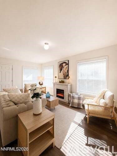 A living room with a fireplace and a couch.