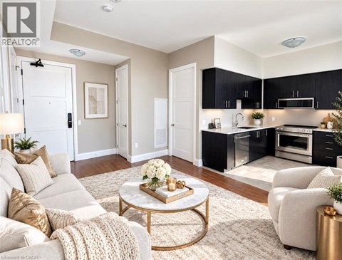 A well-lit living room with a coffee table in the center.