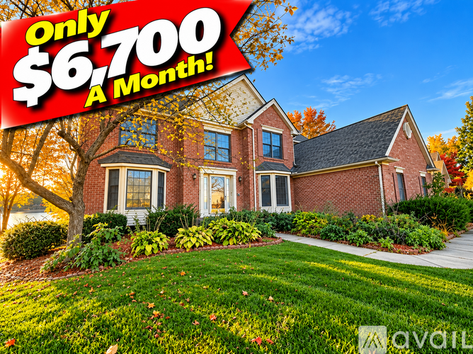 A house with a red banner that says "Only $6,700 A Month!" in front of it.