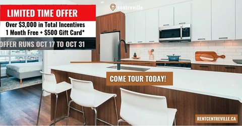 A kitchen with a sign advertising a limited time offer for over $3,000 in total incentives.
