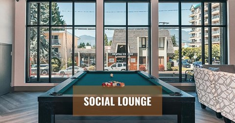 A pool table with a sign that says social lounge.