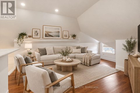 A living room with a grey sofa and a coffee table.