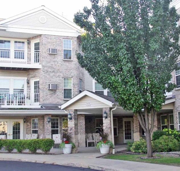 a house with a tree in front of it