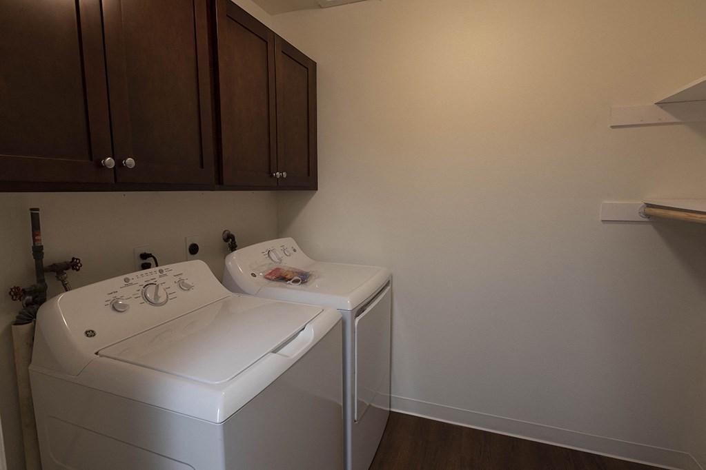 full size washer and dryer in the laundry room