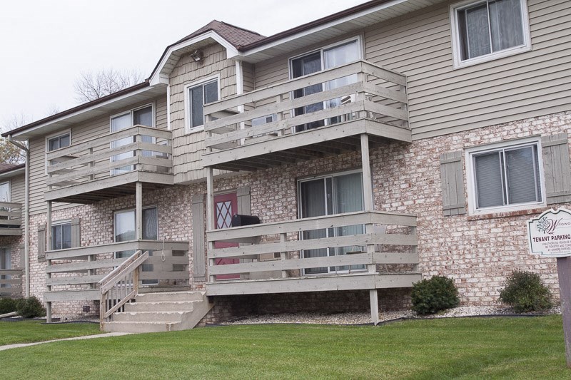 a building with two balconies on the side of it