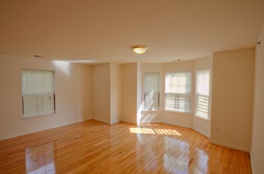 Living room area with hardwood floors
