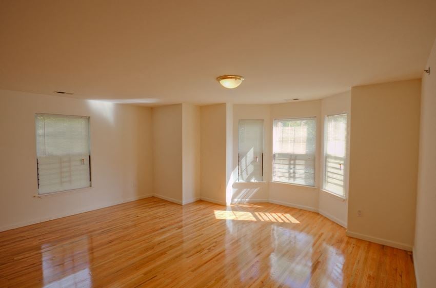 Living room area with hardwood floors - Photo Gallery 1