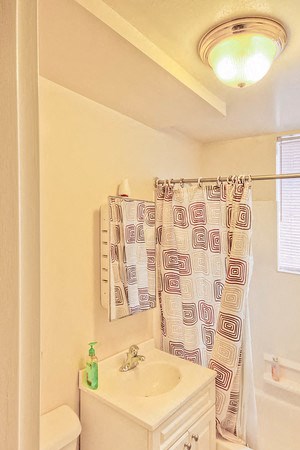 Bathroom with white cabinet