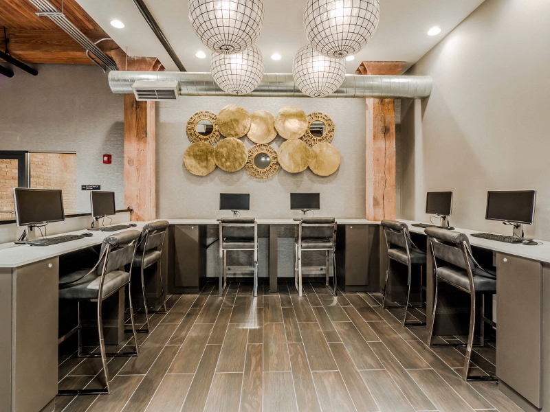 Chicago luxury apartment business center with computers and printer