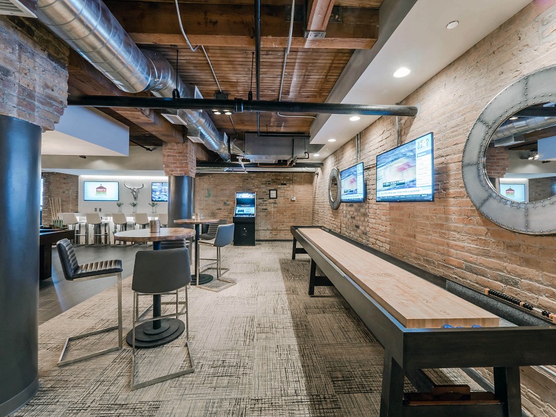 Chicago luxury apartment game room amenity with shuffle board