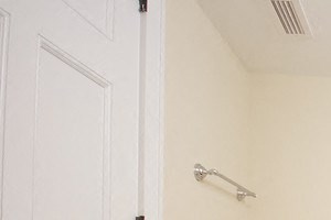 Bathroom with upgraded tiles and cabinets