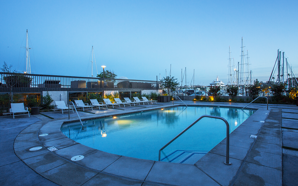 a swimming pool at night at a hotel