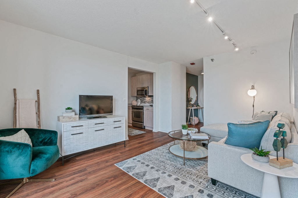 Living area with wood plank flooring at Kingsbury Plaza in River North Chicago at Kingsbury Plaza, Chicago