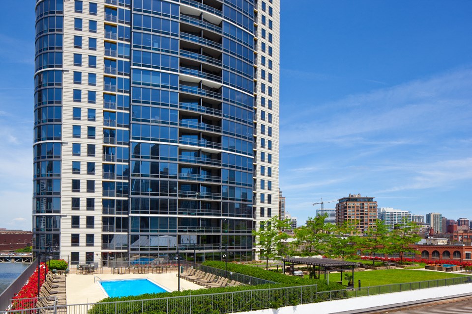 Outdoor photo of pool and whirlpool spa with Kingsbury Plaza building exterior in the background at Kingsbury Plaza, Illinois, 60654