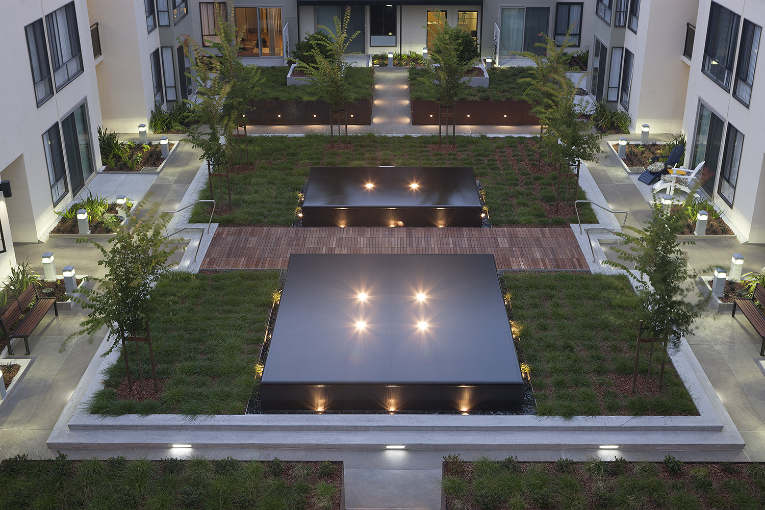 Inner courtyard with a water feature and sitting area.