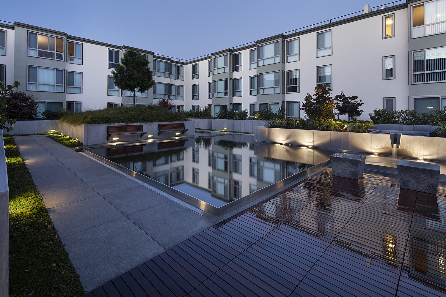 Inner courtyard with a water feature and sitting area.
