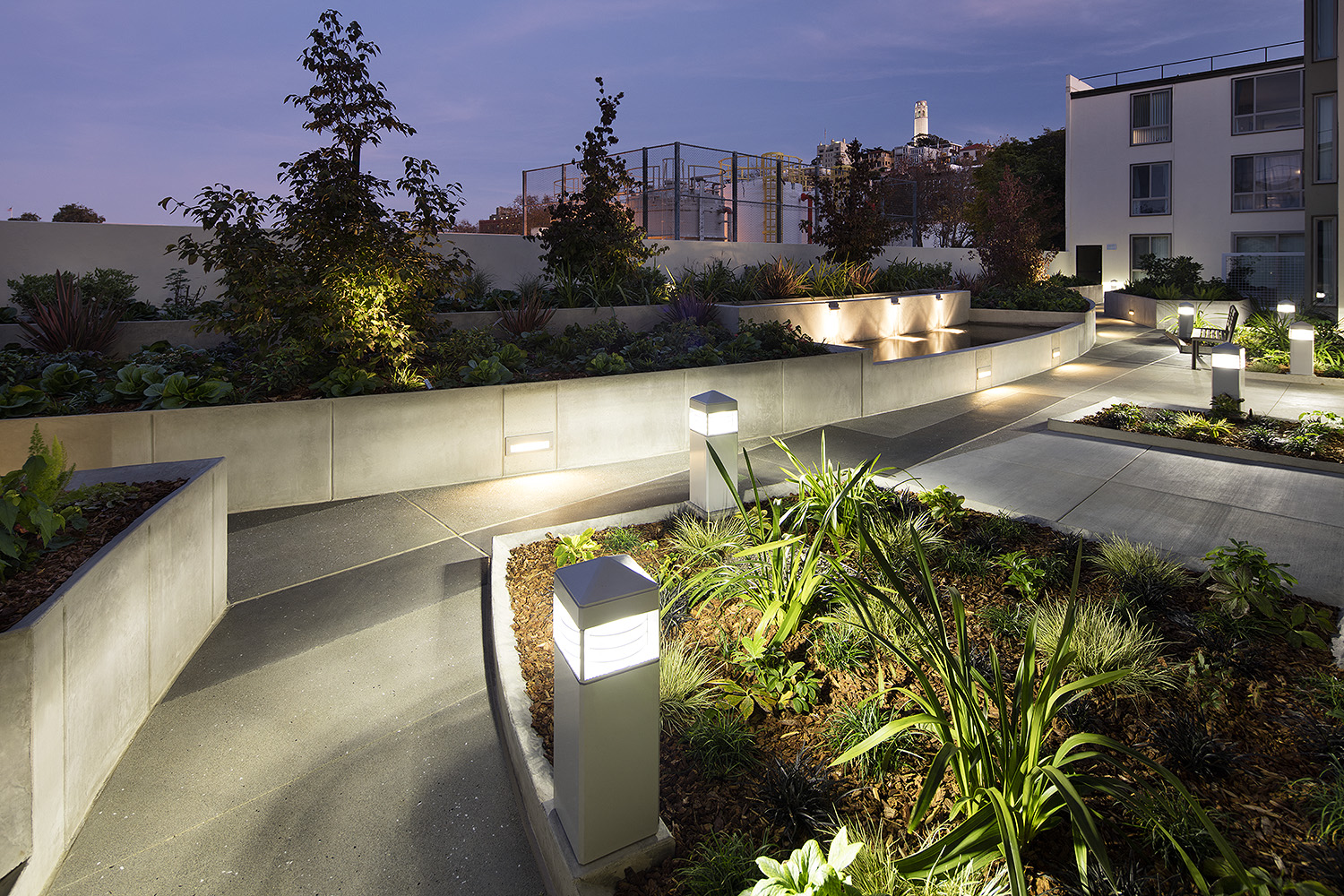 Inner courtyard with a water feature and sitting area.